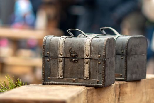 Ancient travel chests in the street craft market.