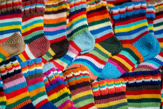 Traditional Latvian knitted woolen mittens and socks