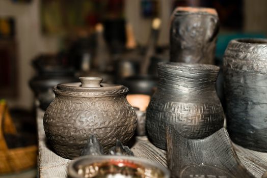  Burnt black ceramics. Burnt clay pots and plates, dishes - Image