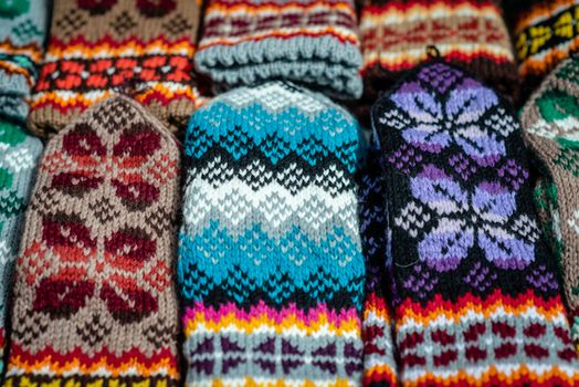 Traditional Latvian knitted woolen mittens and socks