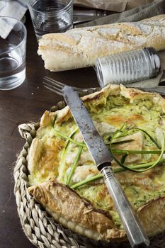 Quiche of vegetables on the table set