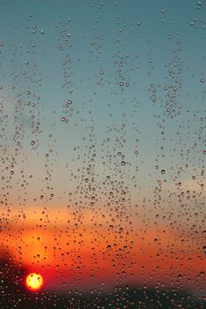 Drops of rain on the inclined window (glass). Shallow DOF