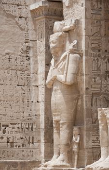 Statue of a pharaoh at the temple of Medinat Habu in Luxor