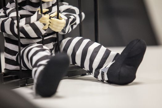 Skeleton toy in a prison