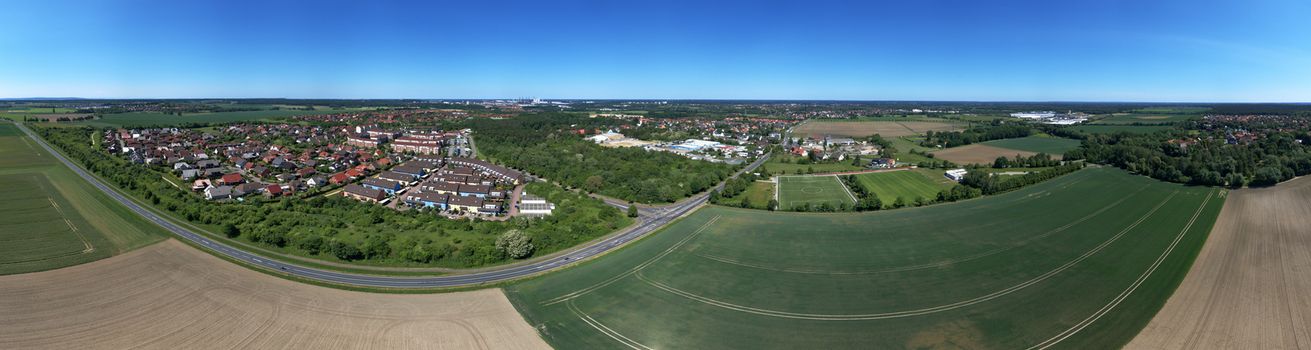 High resolution panorama of fields,meadows and a small village in the north of germany, aerial view, made with drone