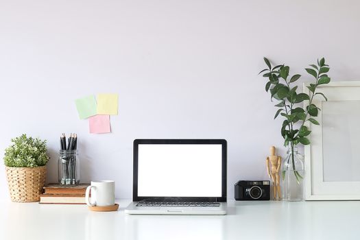 Workspace desk and laptop. copy space and blank screen. Business image, Blank screen laptop and supplies.