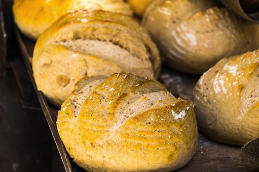 Freshly baked bread on a baking tray, healthy food