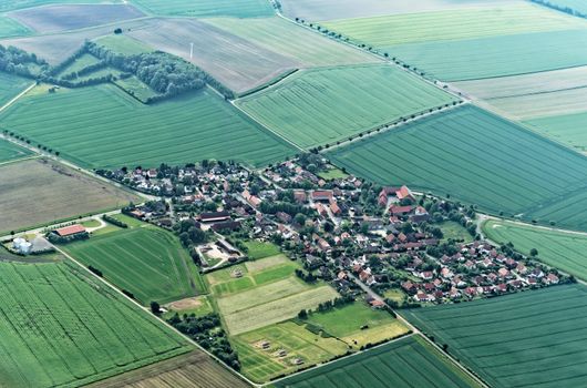 Aerial view from a small airplane 900 meters above sea level from a village suburb of Salzgitter, Germany, lower saxony