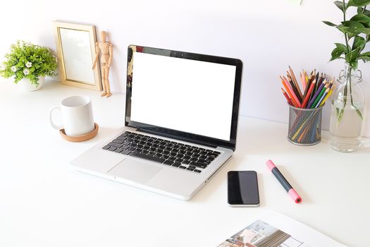 Workspace desk and laptop. copy space and blank screen. Business image, Blank screen laptop and supplies.
