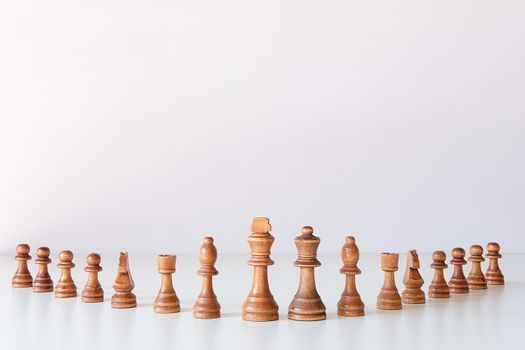 Businessman moving chess figure in competition success management or leadership concept 