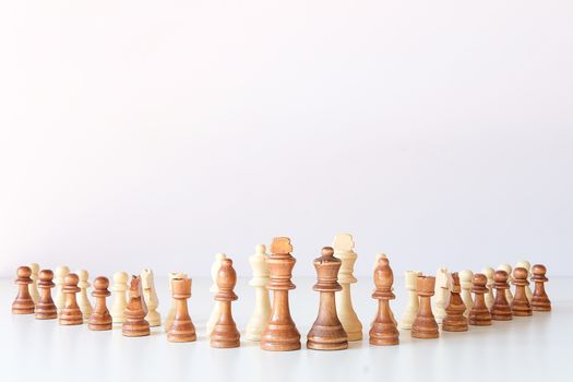 Businessman moving chess figure in competition success management or leadership concept 