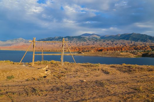 Issyk kul lake with mountains on background in Kyrgyzstan