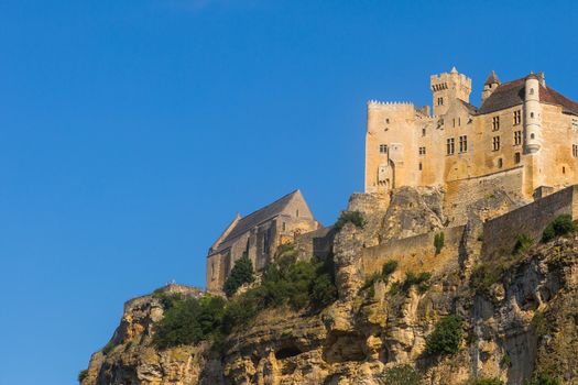 The medieval Chateau de Beynac rising on a limestone cliff above the Dordogne River. France, Dordogne department, Beynac-et-Cazenac