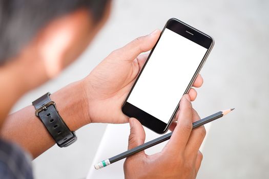 Cropped shot view of man hands holding smart phone with blank copy space screen for your text message or information content, female reading text message on cell telephone during in urban setting. 