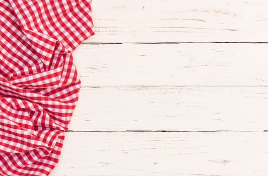 White wooden table background rustic texture, with red checkered tablecloth, high angel view