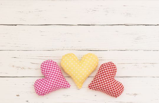 Romantic fabric hearts border for Valentine card on white background