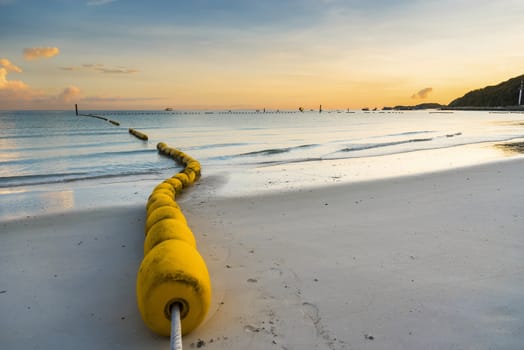 buoyancy on the beach, sign warning dangerous.