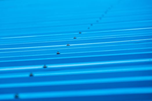 Blue painted metal roof as an abstract background