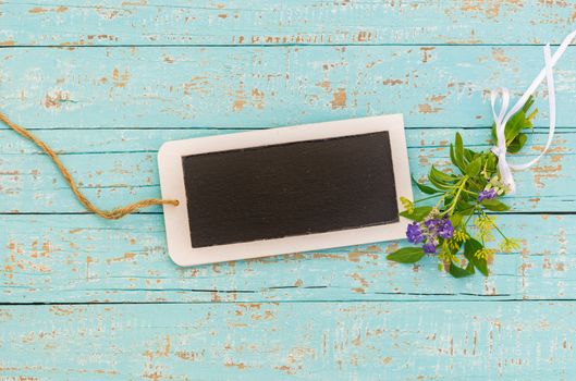 Small empty blackboard for a message for mothers day or birthday greetings
