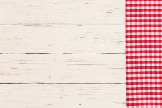 White table background with rustic red tablecloth