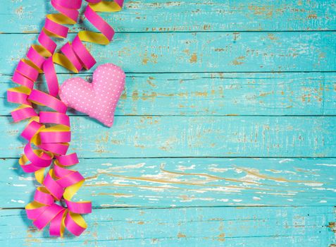 Celebration background with streamers and heart decoration