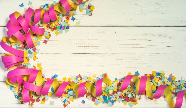 Celebration background with colorful streamers and confetti decoration