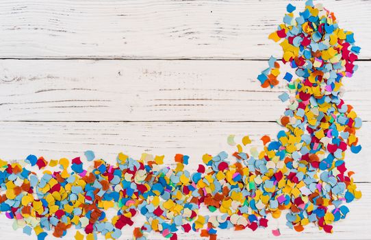 Confetti decoration on white background for party, birthday or carnival celebration