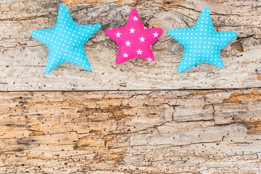 Background with heart and stars on rustic wood