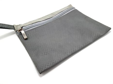 Gray color portable pouch use to put small items inside and carry 