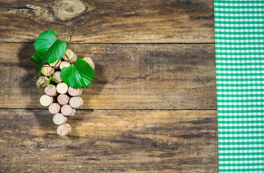 Winery background with bunch of grapes shape made with wine corks