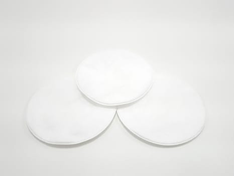 White circle facial pads use to put make up on face for girls