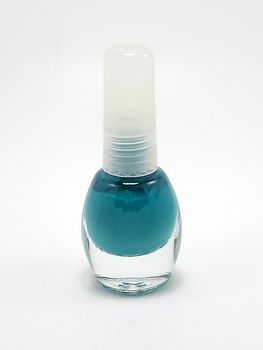 Turquoise nail polish with brush inside in the bottle use to coat ladies nails