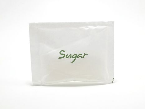 White sachet sugar use to mix on beverages and cooking of foods