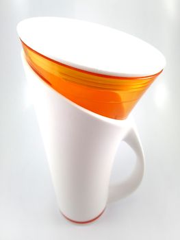 Orange and white color long plastic drinking cup with handle use to drink water content 