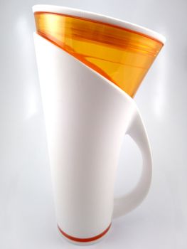 Orange and white color long plastic drinking cup with handle use to drink water content 