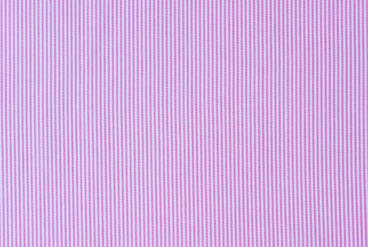 Pink and white striped fabric background texture 