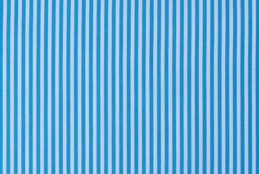 Light blue and white striped fabric background texture 