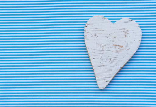 Baby boy birthday greeting card with light blue background heart and copy space