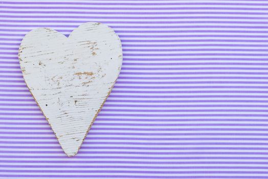 Valentine's day background with romantic white wooden heart and copy space