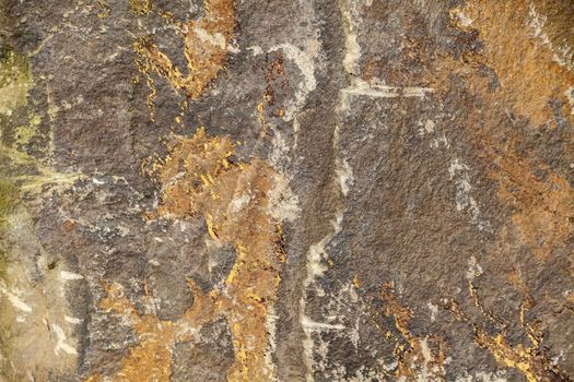 Background texture of weathered standing stone rock