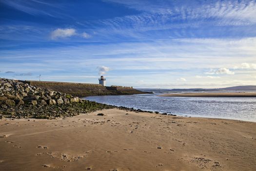 Georgian Lighthouse on the Burry Port coast Carmarthenshire Wales near the Gower Peninsula at the Loughor Estuary