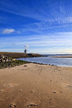 Georgian Lighthouse on the Burry Port coast Carmarthenshire Wales near the Gower Peninsula at the Loughor Estuary
