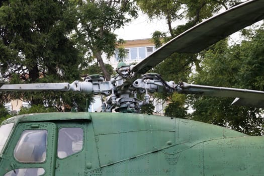 propeller of an old helicopter closeup on nature background