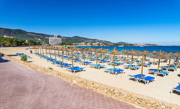 Sand beach Platja de Palmanova on Mallorca, seaside beach tourist resort, Spain Mediterranean Sea