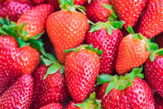 Red ripe delicious strawberries, close-up