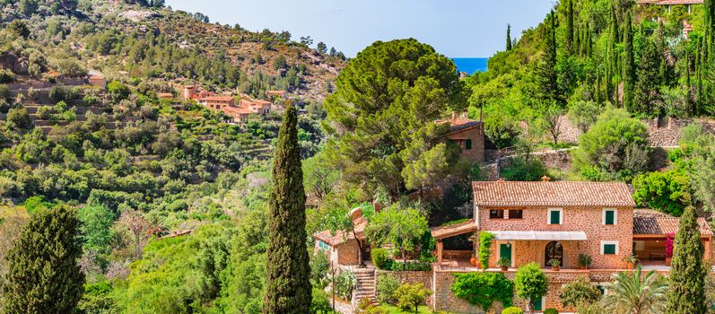 Typical houses in the small village of Deia in the Tramuntana mountains on Mallorca island, Spain