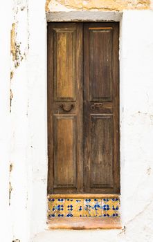 Close-up of old wooden front door residence entrance 