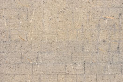 Old gray brick stone wall background texture