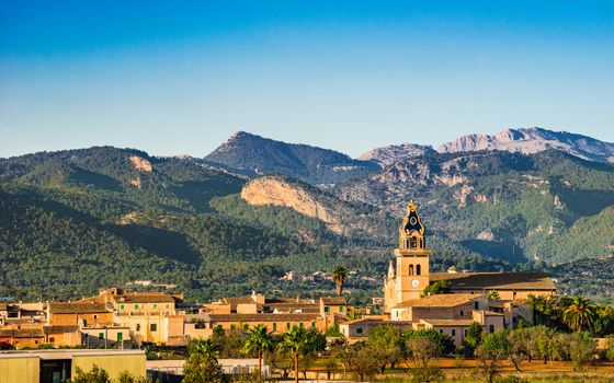 Beautiful mediterranean village with mountain landscape on Mallorca island, Spain