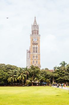 Rajabai Clock Tower and Oval Maidan on a clear evening in Mumbai India